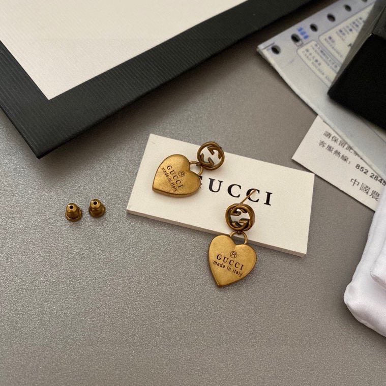 G u c c I earrings