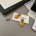 G u c c I earrings