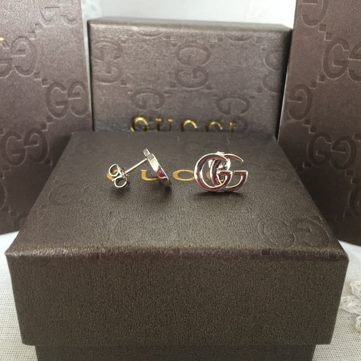 G u c c I earrings