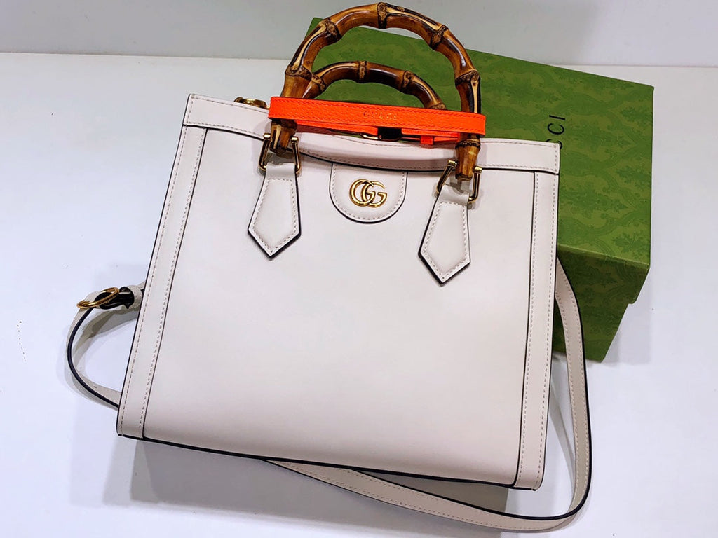 G u c c i white 20x 16x 10 or 27x 24x 11